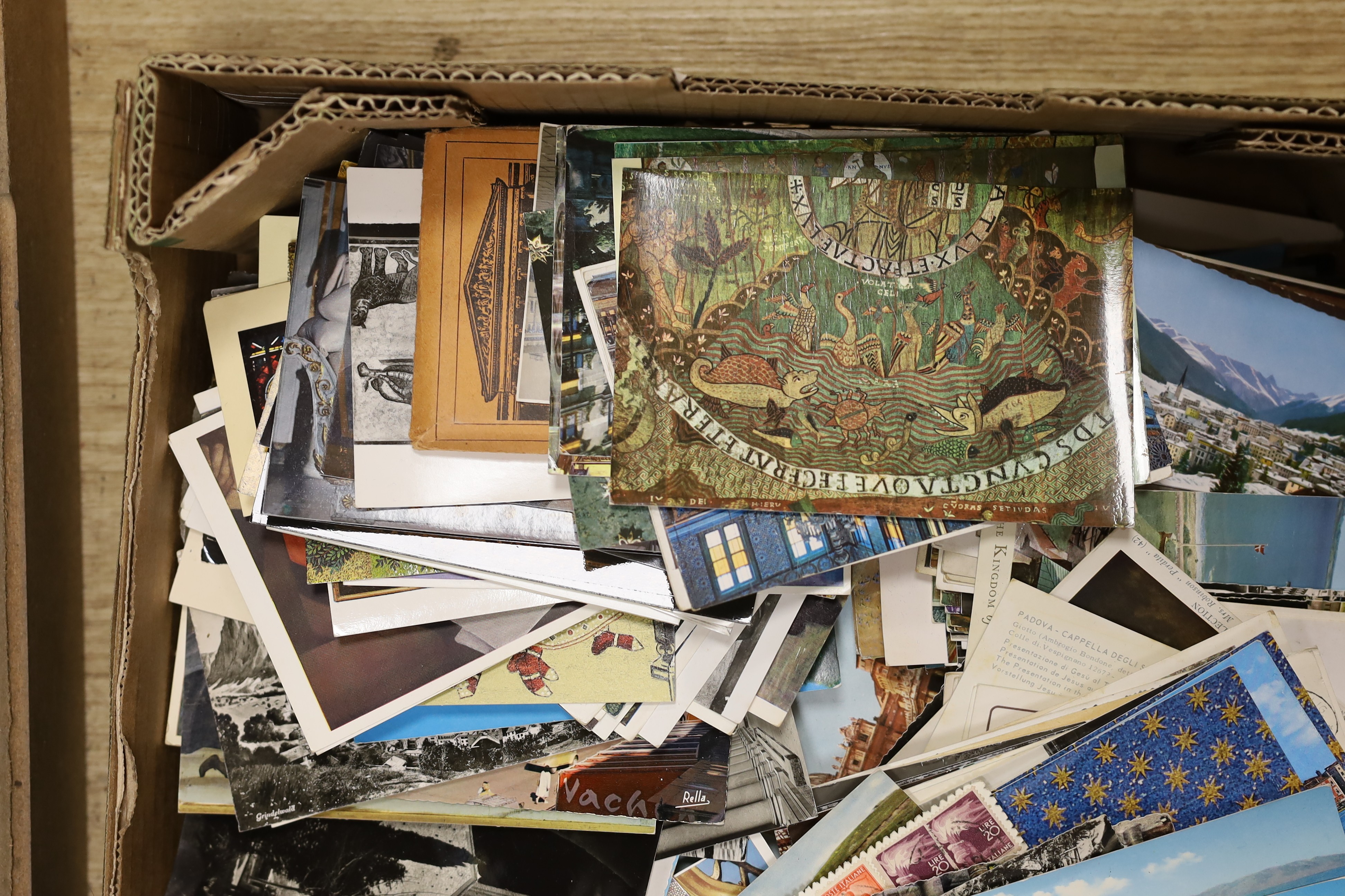 A quantity of postcards photos
